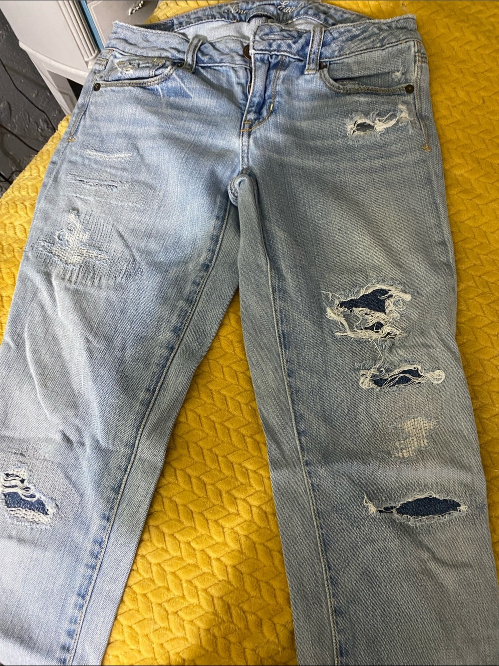 Distressed jeans made tbis way wore few times